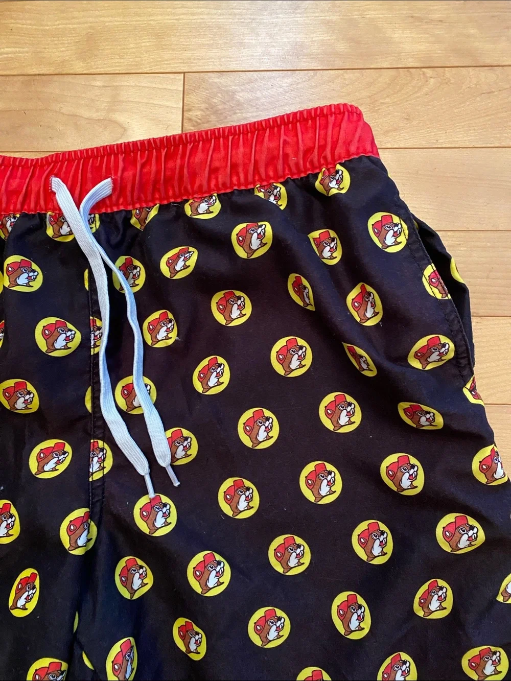 Men's Buc-red Black Swim Trunks with Red Waistband and Yellow Accent Print
